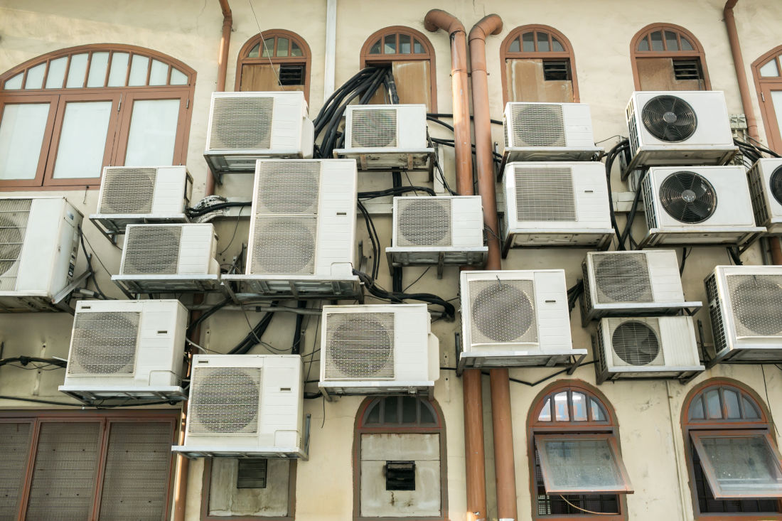 a wall of air conditioners in Singapore